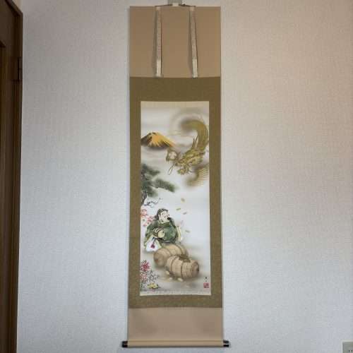 traditional japanese hanging scroll with the gods of fortune